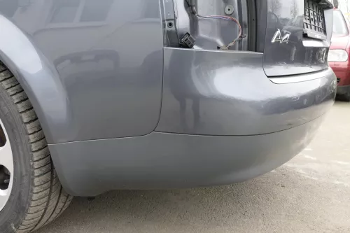 Audi A4 8E B6 Kombi Avant Stoßstange hinten mit Spoiler grau LX7Z (122709)