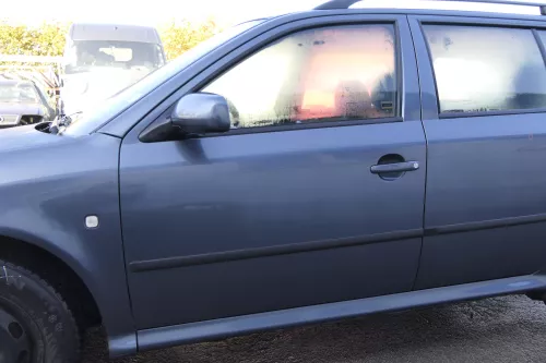 Skoda Octavia 1U Kombi + Limo Tür vorne links Fahrertür grau LF7V 9901 U9 ohne A (165487)