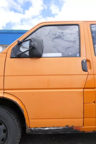 VW T4 Tür vorne links orange LP2C Fahrertür 701831055H bis ca1996 ohneAnbauteile (170597)