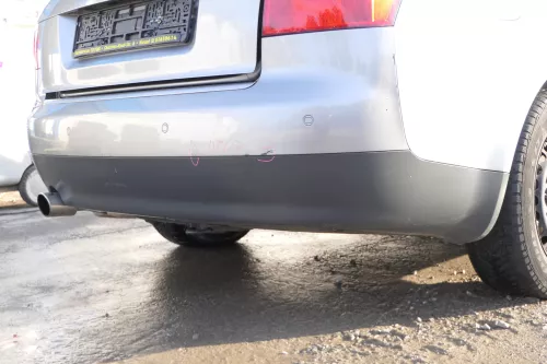 Audi A4 8E B6 Limousine Stoßstange hinten mit Spoiler grau LY7Q PDC (172050)