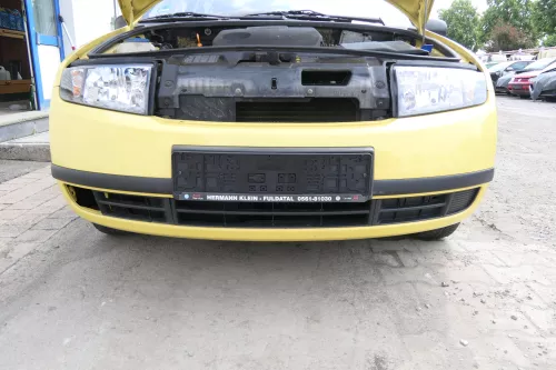 Skoda Fabia 6Y Stoßstange Stoßfänger vorne gelb LF1R 2000-2004 