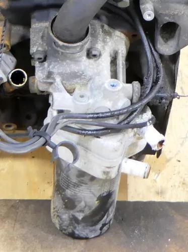 VW Audi Passat 3BG Ölkühler Halter Ölfilterflansch 06A115405BS BAWT AWM AZM (176990)